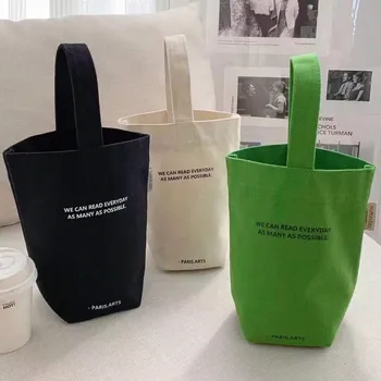 2023 nieuwe minimalistische stijl mini draagbare canvas tas lunch zak snoep kleur waterkoker polsband normaal canvas tas